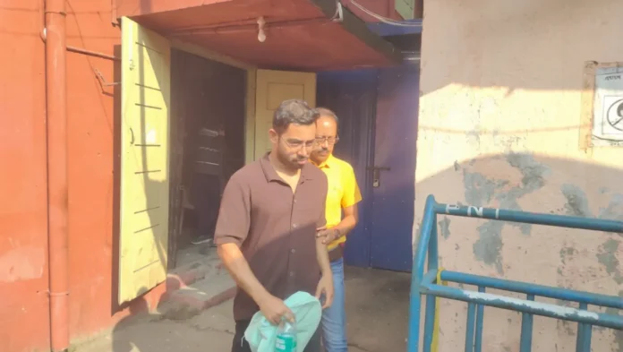 Police escort TMCP leader Biswajit Sarkar after his arrest in connection with the Siliguri College violence case. Thursday, 28 May 2026.