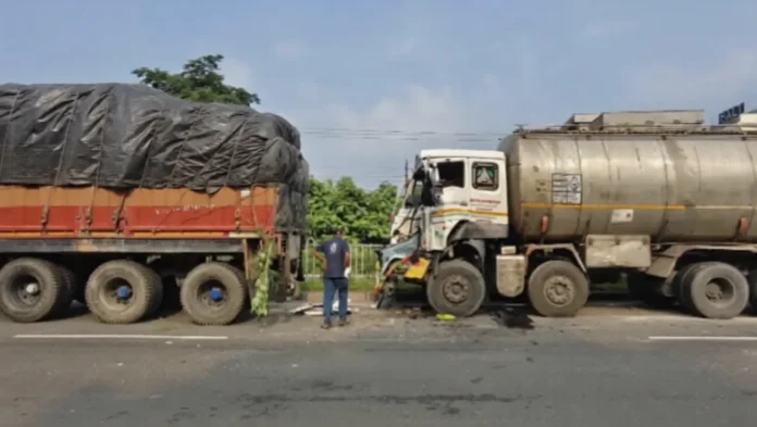 The damaged mustard oil tanker after crashing into a stationary wheat-laden trailer near Murder More in Fulbari on Tuesday morning. 02 June 2026.